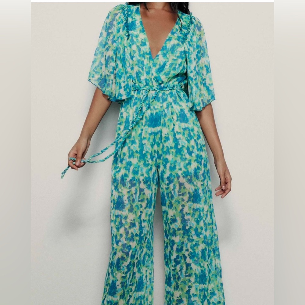 Zara floral jumpsuit 
Never worn
